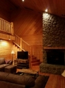 Bear Living Room has a Wood-Burning Fireplace and Satellite TV. There is a Queen Sofa Sleeper.