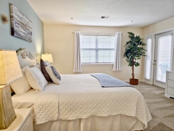 The Master Bedroom is furnished with a spacious King-size bed.