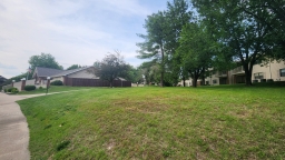 The Clubhouse is located on the left, while the courtyard is situated to the right.
