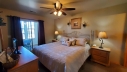 Master Bedroom has a King Size Bed with Cable TV & Free Wi-Fi. Walk out to the Enclosed Porch from the Bedroom. Bathroom with Jacuzzi Tub/Shower adjoining the Bedroom.