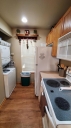 This fully stocked kitchen has it all. There is a Keurig, regular coffee maker and coffee. There is a washer and dryer.