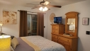 This Master BR has a King Bed and a Flat Screen TV with Cable TV and an Adjoining Bathroom with a Jacuzzi Tub. 