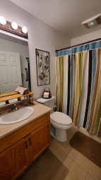 Guest bathroom off the dining room and bedroom.