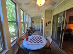 The Sunroom invites you to relax and play! Enjoy a delightful selection of board games for a perfect evening with loved ones.
