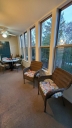 Enjoy the relaxing enclosed sunroom on the lake. There are checkers and other games for your enjoyment.