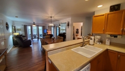 The kitchen has a washer/dryer and is fully stocked.