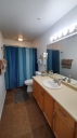 Master Bathroom is privately off master bedroom. There is a jetted tub/shower, a blow dryer and more.