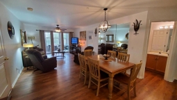 The living room has a rocker recliner, Queen sofa sleeper, cable TV, Wi-Fi, DVD player and lots of movies in the drawer under the TV. There are games in the drawer and large checker game in the sun room.