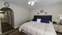 The master bedroom has a King size bed, and a master bathroom adjoining the bedroom. 