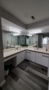 The master bathroom adjoins the master bedroom and it includes his/hers sinks, a large jetted tub/shower.