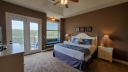 Master Bedroom has a King, an Alcove, Flat Screen Cable TV and the Bathroom adjoins the Bedroom. Great Views of the Ozark Mountains, Table Rock Lake and Silver Dollar City.