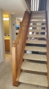 Hallway steps go up to the loft bedroom.