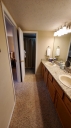 Master bathroom has his and hers sinks.