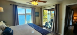 Relax in bed and enjoy breathtaking views of Table Rock Lake from the comfort of the master bedroom.
