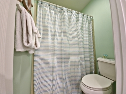 The guest bathroom is conveniently connected to the bedroom for easy access.