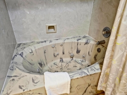 Indulge in a soothing soak in the generously sized jetted tub located in the master bathroom.