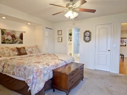 The master bedroom has a nice King-size bed, flat screen TV with cable. The master bathroom adjoins the bedroom. Walk out to the screened-in porch from the master bedroom.