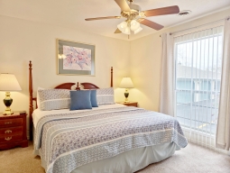 The guest bedroom has a comfortable King-size bed and a flat screen TV with cable.