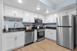 Cook up a storm in our fully equipped kitchen featuring a sink, oven, stove, microwave, coffee maker, refrigerator, freezer, and dishwasheru2014everything you need for a delightful stay!