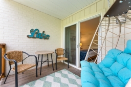 Savor the tranquility of the balcony with picturesque views of Roark Creek, a delightful spot for fishermen. Immerse yourself in the serene atmosphere and the beauty of nature right outside your door!