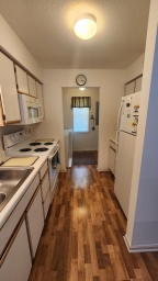 Fully Stocked Kitchen. Laundry Room is off the Kitchen.