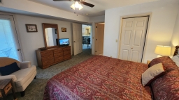 Master bedroom has a King size bed, a flat screen cable TV and Free Wi-Fi. The bathroom is privately off the bedroom. Walk out to the deck from the bedroom.