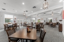 After a day on the golf course or by the pool, unwind at the 19th Hole Bar and Grill on the lower level of the Clubhouse. Savor tasty bites and cool beverages in a cozy setting, the ideal spot to relax and share stories with friends!